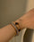Black clover, tennis and twisted bracelet stack